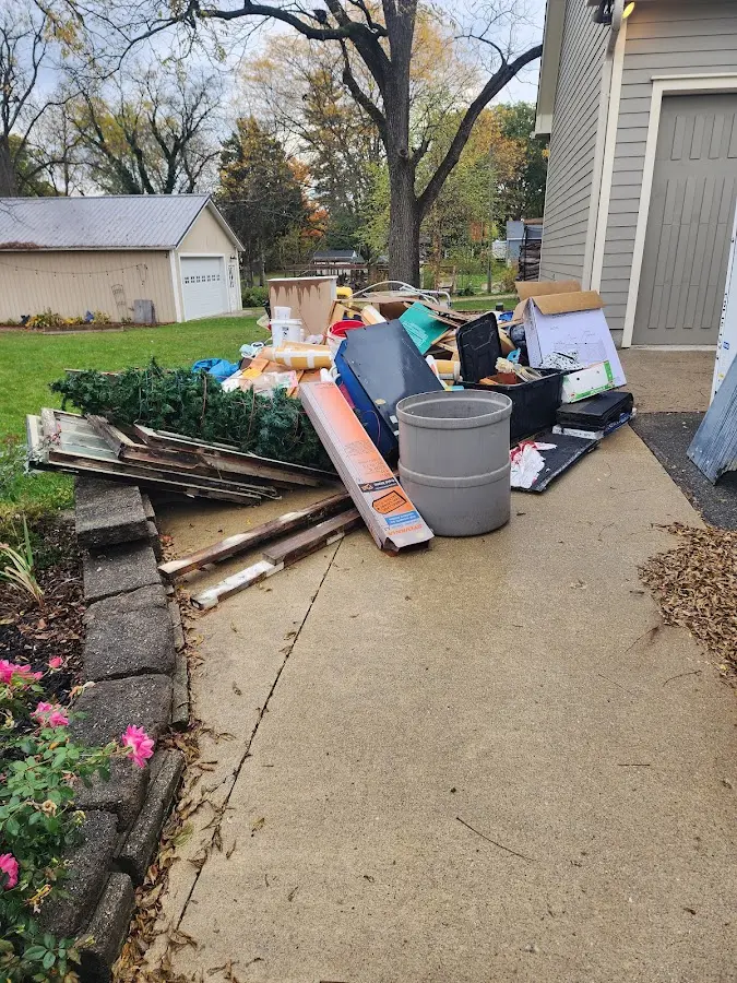 Dumpster being loaded with debris for 3 Yard Dumpster Rental in Sewickley